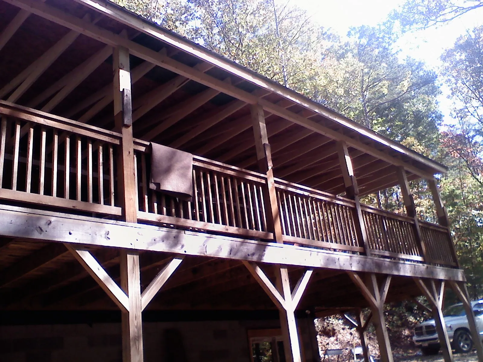 Timber framing under a new elevated porch and deck — Roof Leak Repair in Ephraim by Roofing Brothers